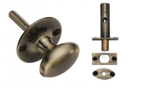 Click Here To Enlarge This Photo Of BT5&plus;RB7-AT Heritage Brass Oval Thumbturn with Bolt Antique Brass Finish