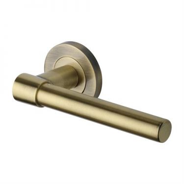 Click Here To Enlarge This Photo Of RS2017-AT Heritage Brass Door Handle Lever on Rose Phoenix Design Antique Brass Finish