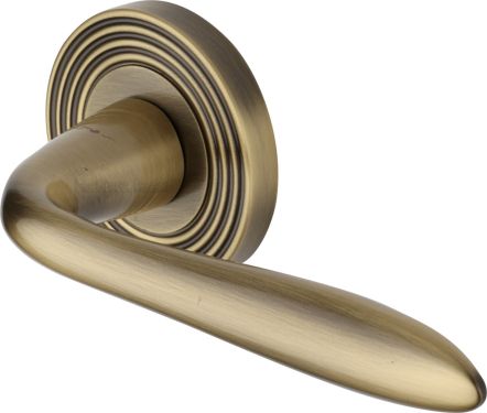 Click Here To Enlarge This Photo Of RR1752-AT Heritage Brass Door Handle Lever Latch on Round Rose Sutton Reeded Design Antique Brass finish