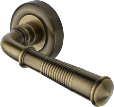 Click Here To Enlarge This Photo Of V1936-AT Heritage Brass Door Handle Lever Latch on Round Rose Colonial Reeded Design Antique Brass finish