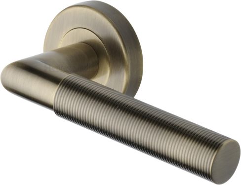 Click Here To Enlarge This Photo Of V2274-AT Heritage Brass Door Handle Lever Latch on Round Rose Bauhaus Mitre Reeded Design Antique Brass finish