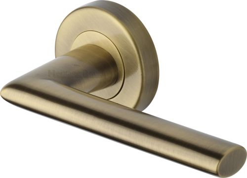 Click Here To Enlarge This Photo Of V2355-AT Heritage Brass Door Handle Lever Latch on Round Rose Admiralty Design Antique Brass finish
