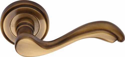 Click Here To Enlarge This Photo Of V1601-AT Heritage Brass Door Handle Lever Latch on Round Rose Lisboa Design Antique Brass Finish
