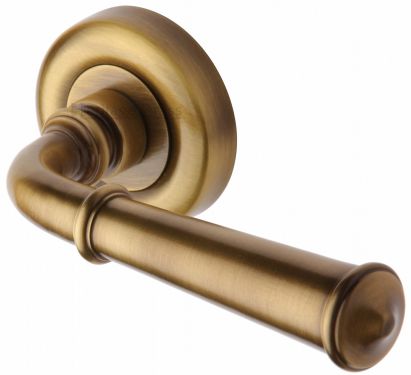 Click Here To Enlarge This Photo Of V1932-AT Heritage Brass Door Handle Lever Latch on Round Rose Colonial Design Antique Brass Finish