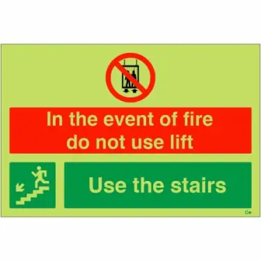 Click Here To Enlarge This Photo Of Photoluminescent &lpar;Glow in the Dark&rpar; Rigid Plastic &lpar;Class C&rpar; "In The Event Of Fire Do Not Use Lift - Use Stairs" Down Left Sign