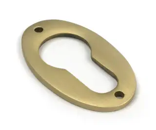 52458 From The Anvil Satin Brass Oval Euro Escutcheon